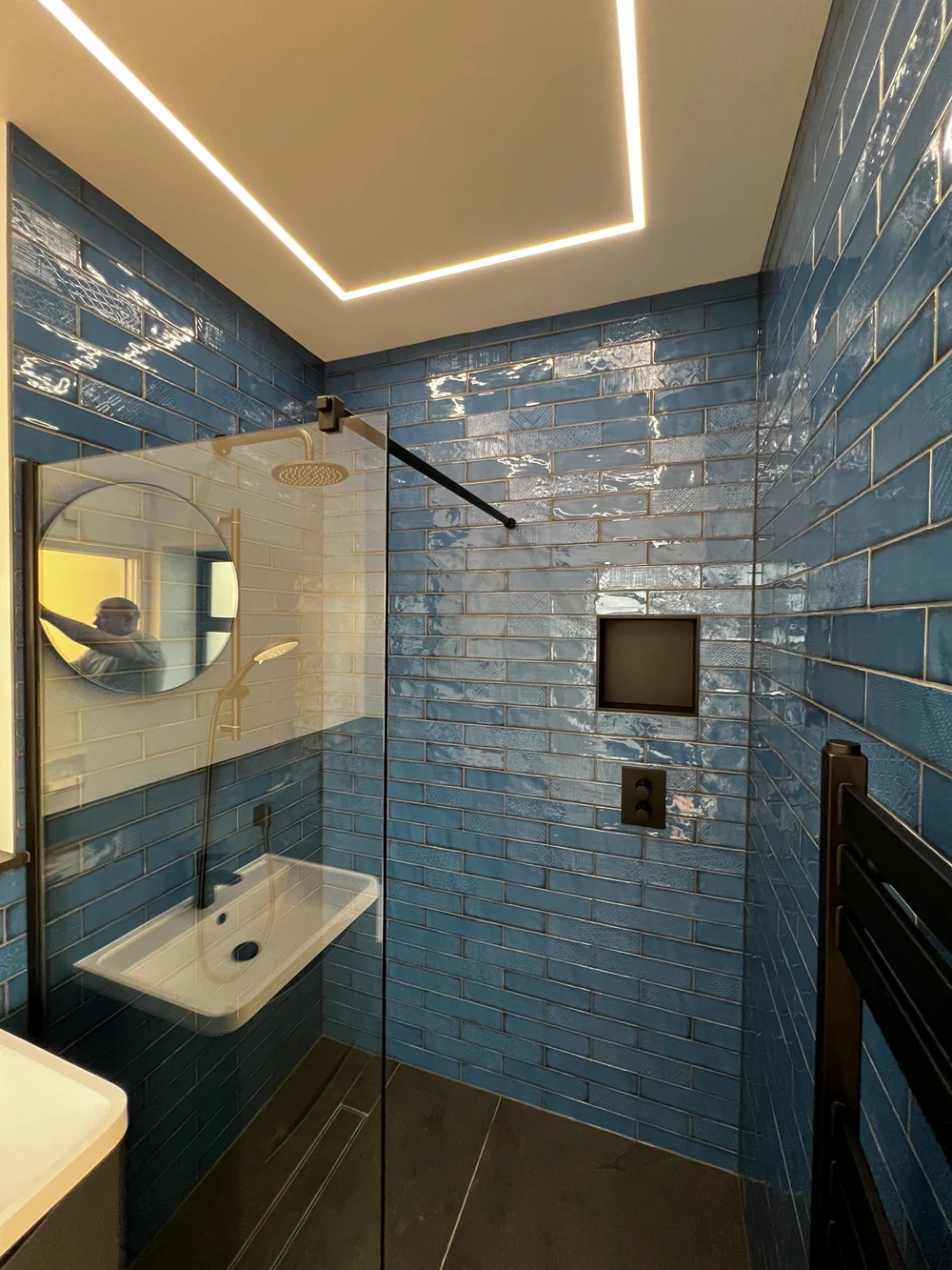 Shower room with brick-style tiling